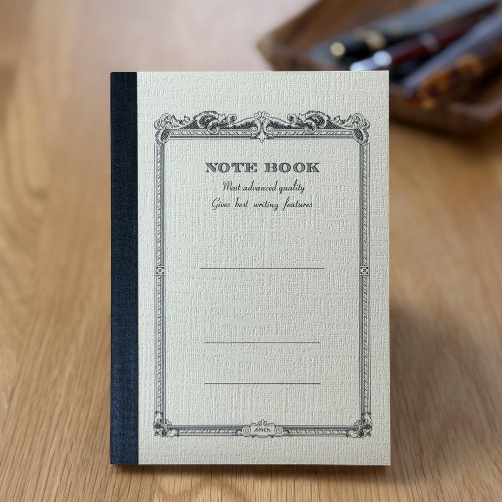 Apica CD Notebook A6 in Yellow, standing upright