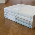 Stack of four Midori MD Notebook A6 ruling types — Blank, Lined, Grid, and Dot Grid